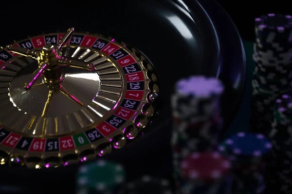 Live roulette table interface on kck slot showing wheel, betting grid, and dealer